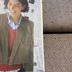 Tweed -  bruin met glitter steentjes -  €52/m